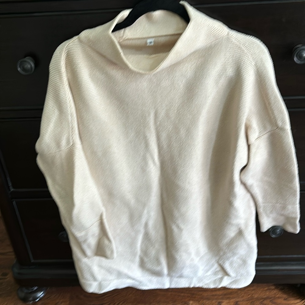 Ivory colored mock neck sweater